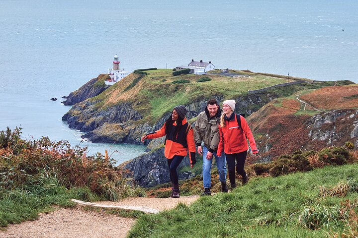 Experience stunning coastal views and the charm of Howth village while exploring secret paths with local guides. Embrace nature history and vibrant conversations on this unforgettable hiking adventure.