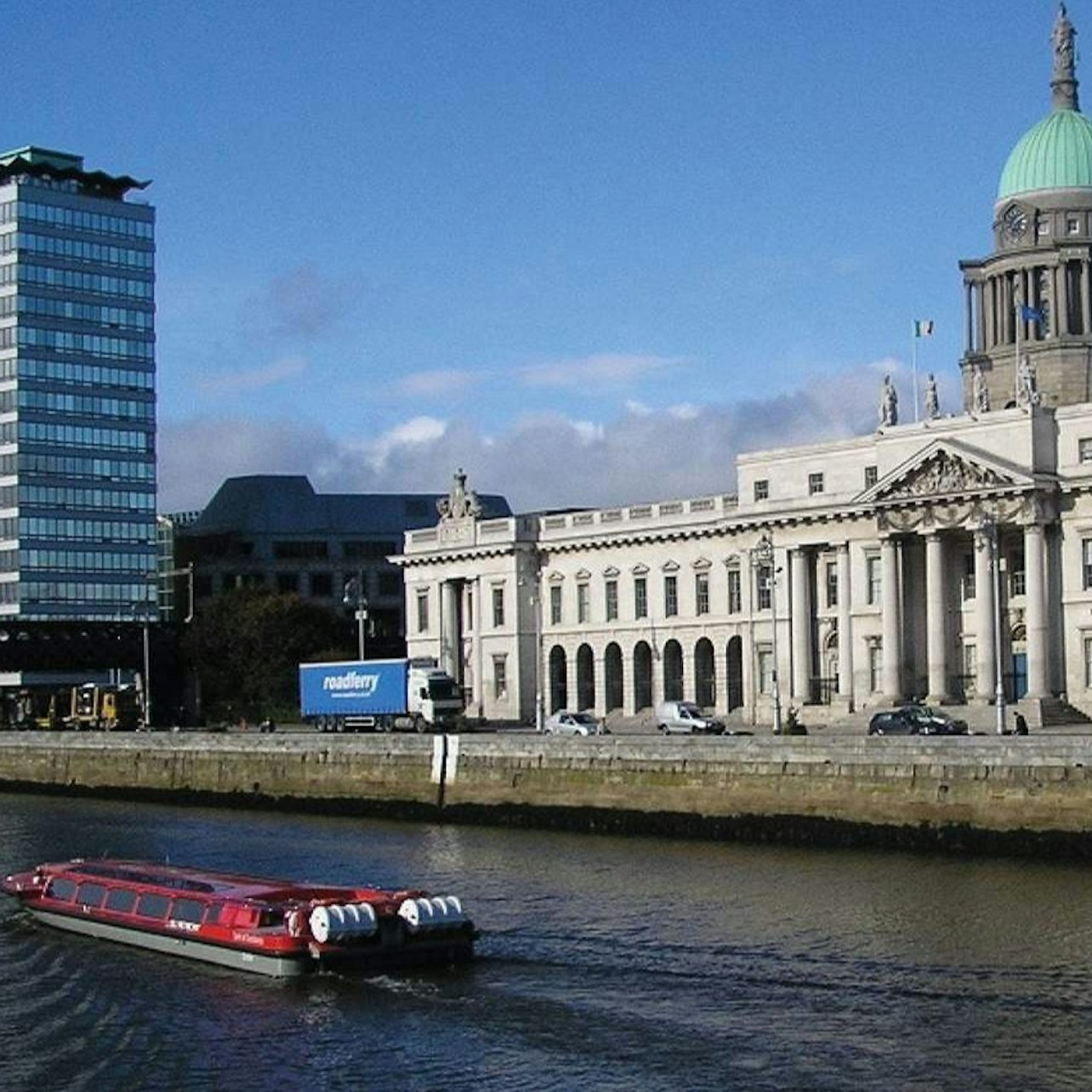 Drift along Dublin's River passing under the iconic O’Connell Bridge and admiring the stunning architecture of the 18th-century Custom House amidst the city's rich history.