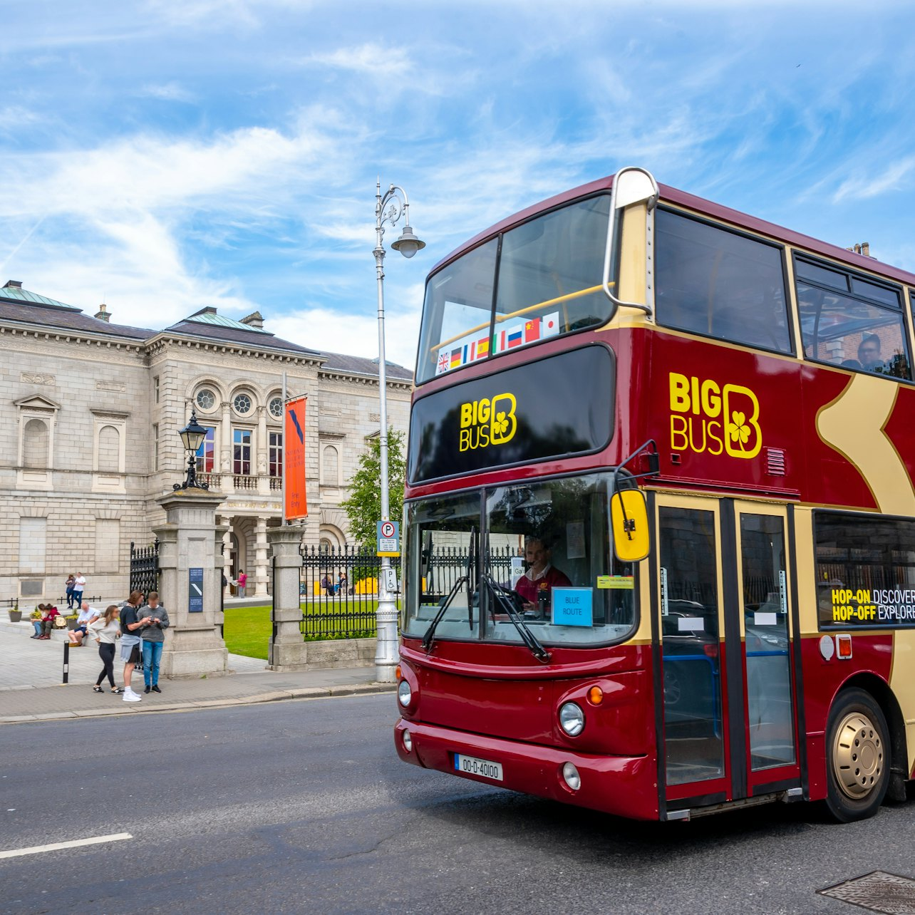 Explore Dublin's rich heritage from the iconic hop-on hop-off bus navigating past historic landmarks like Trinity College and the National Museum all while enjoying informative multilingual commentary.