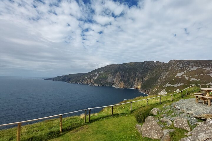 Discover breathtaking views at Slieve League Cliffs where dramatic landscapes meet tranquil waters offering an unforgettable experience for those journeying from Dublin. Tailored adventures await.