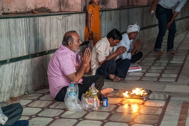 People pray in Osian Temple.