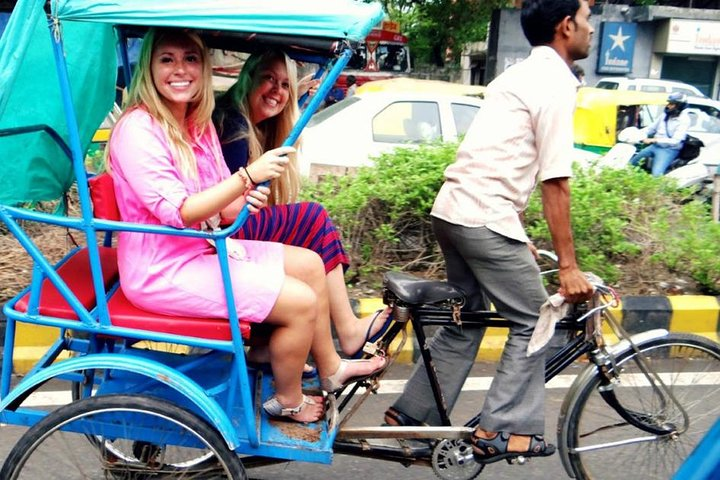 Guest enjoying Rickshaw Ride in Old Delhi.