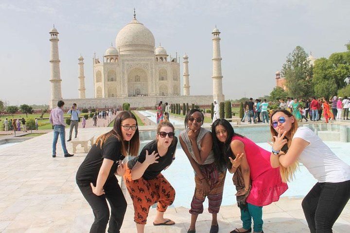 Client posing at Taj mahal