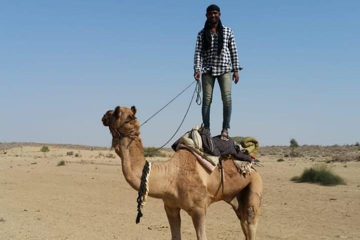 Raj on top of his camel