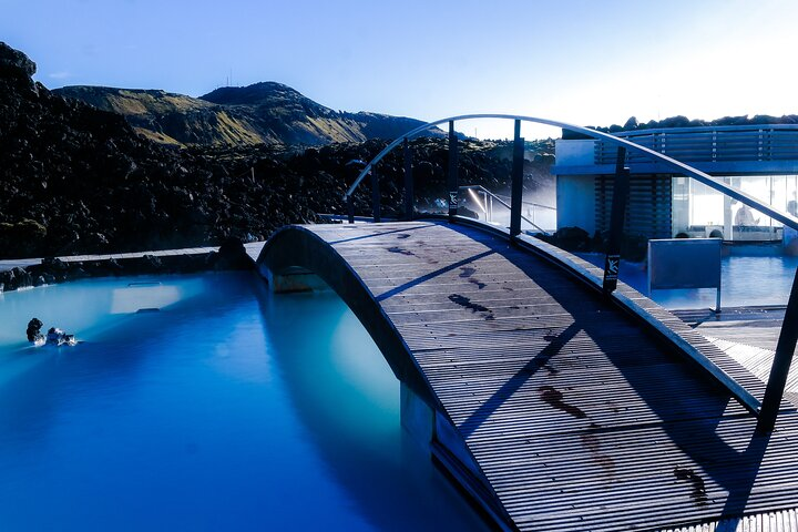 Immerse in the serene Blue Lagoon where soothing waters meet stunning landscapes. A perfect spot to relax after exploring Iceland's breathtaking sights during your 5-day adventure.