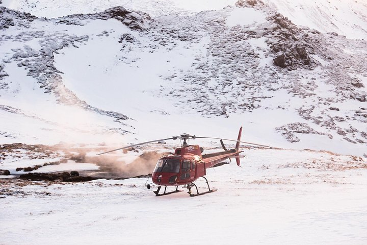 Experience breathtaking aerial views of Iceland's geothermal wonders including hot springs and geysers on a unique helicopter adventure from Reykjavik. Explore the raw beauty of nature like never before.