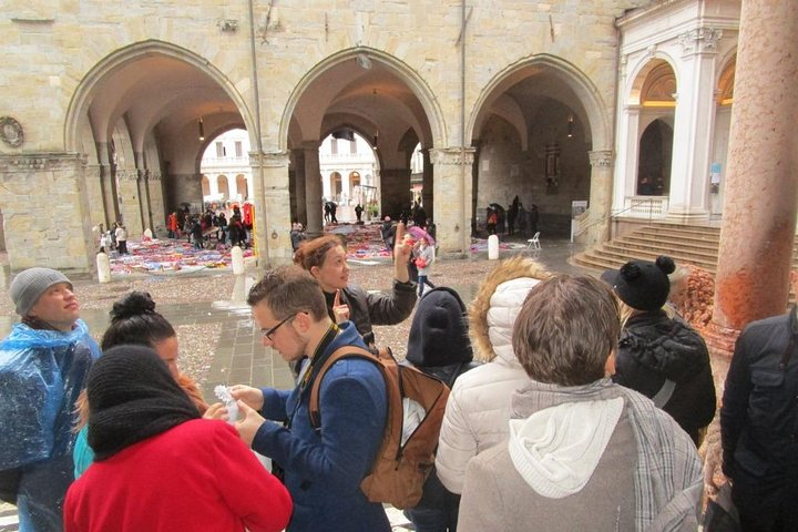 With a group of Russian tourists in a historic part of Bergamo