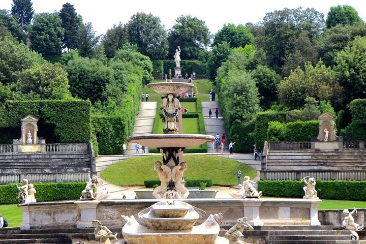 Explore the stunning landscape of Boboli Gardens adorned with historical statues and enchanting fountains where every corner tells a story of Renaissance beauty and elegance.
