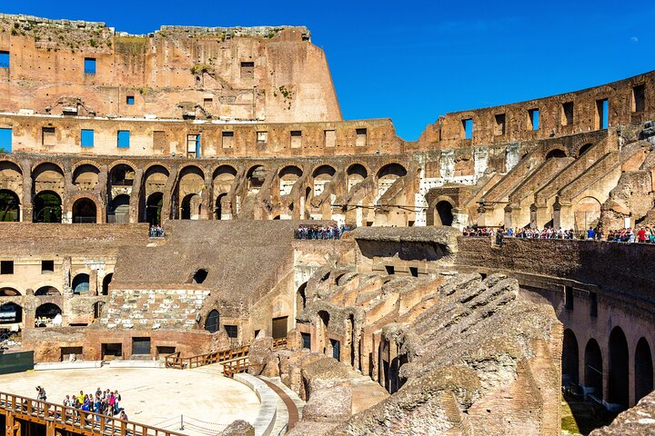 The Colosseum or Flavian Amphitheatre is a large ellipsoid arena built in the first century