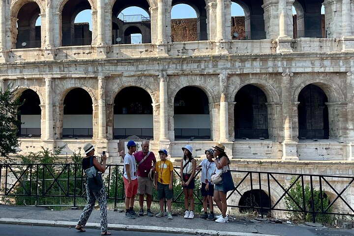 Experience the grandeur of ancient Rome with an expert guide exploring the iconic Colosseum Palatine Hill and Roman Forum while avoiding long lines and stepping back into history.