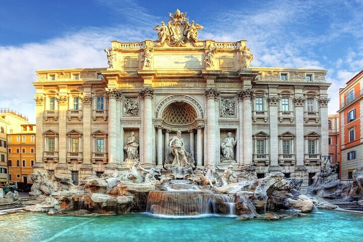 Discover the breathtaking beauty of the Trevi Fountain where stunning sculptures and flowing water intertwine creating a memorable experience in the heart of Rome's historic charm.