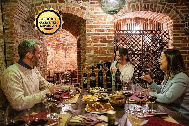 Indulge in a delightful evening of wine and cheese surrounded by rustic charm. Savor local flavors while enjoying the company of fellow travelers in a historic Tuscan cellar.