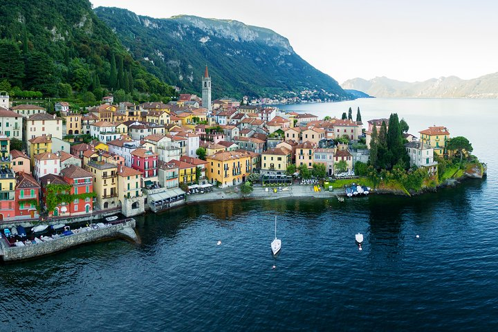 Explore the charming village of Varenna where colorful homes meet serene waters and enjoy stunning lake views while cruising and discovering the hidden treasures of Lake Como.