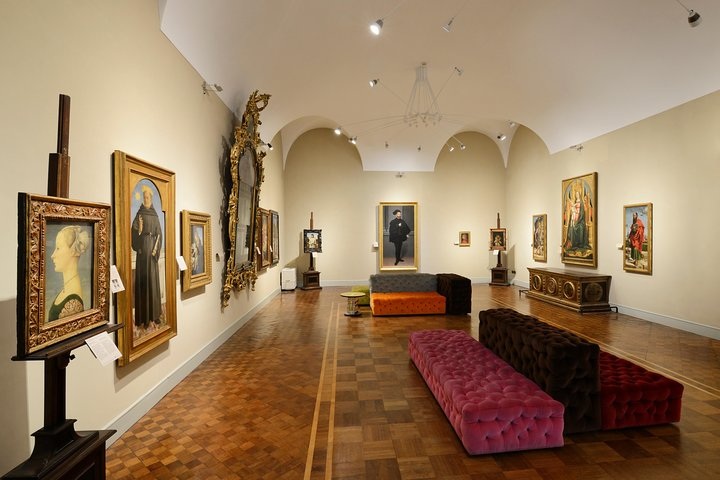 Step into a world of artistic treasures at Museo Poldi Pezzoli where every corner reveals stunning paintings and intricate details inviting travelers to explore Milan's rich cultural heritage.