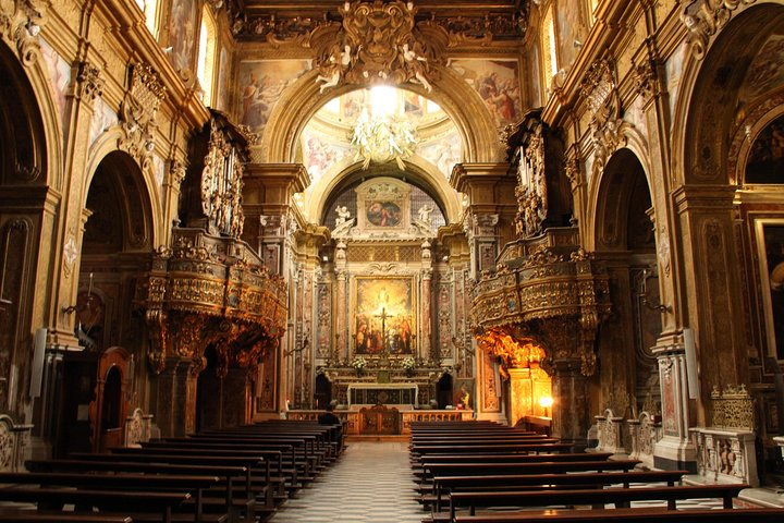 Admire the beautiful interior of Gesu Nuovo