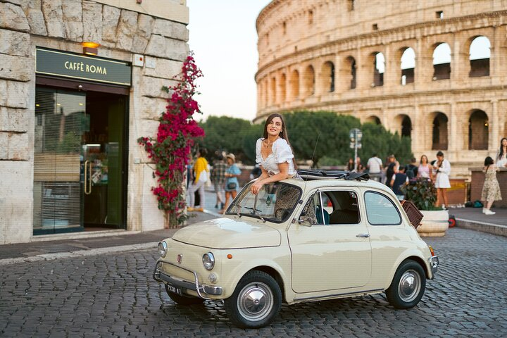 Experience the charm of Rome from a classic Fiat 500 cruising past iconic landmarks while a professional photographer captures your unforgettable moments against stunning backdrops.