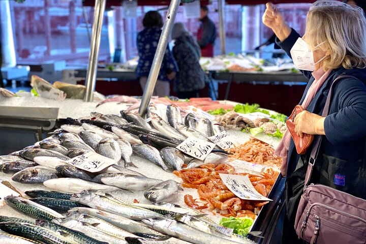 Explore the lively Rialto Market where fresh seafood and local delicacies showcase Venice's culinary heritage inviting travelers to indulge in authentic tastes and unforgettable experiences.