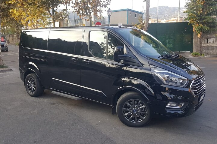 Shared shuttle service from Positano to Naples Central Station - Photo 1 of 2