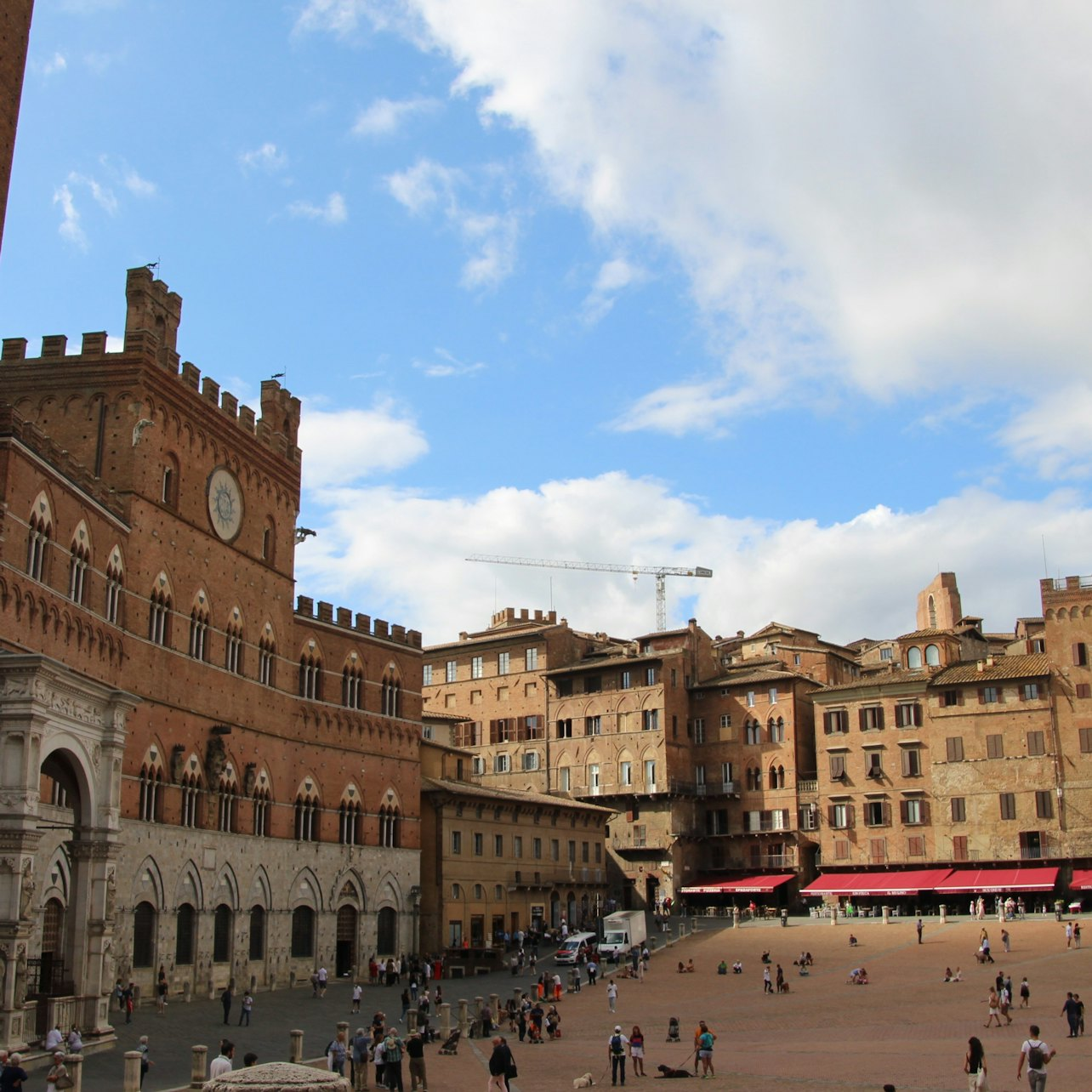 Explore the historic charm of Piazza del Campo in Siena surrounded by stunning medieval architecture and vibrant local life. A perfect snapshot of Tuscan culture and beauty awaits travelers.