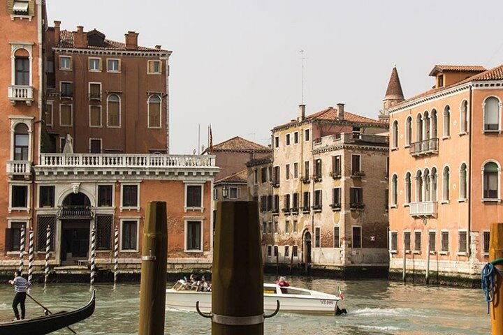 Explore the winding canals and historic buildings of Venice where iconic scenes from Commissario Brunetti come alive revealing the city's rich culture and charm with every step.
