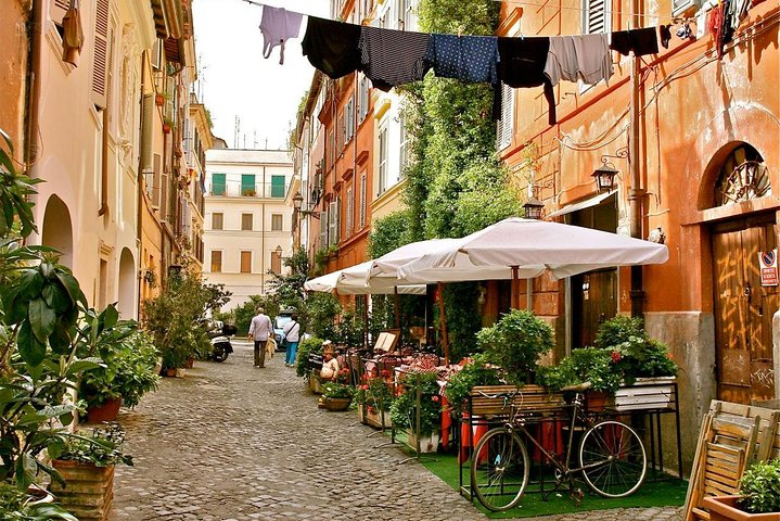 Exploring charming streets lined with vibrant florals and cozy cafes captures the essence of Trastevere and the Jewish Ghetto inviting travelers to soak in Rome's rich culture.