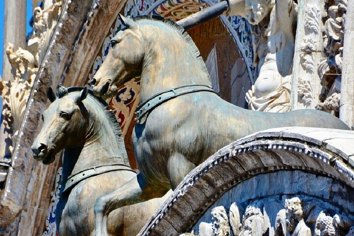 Discover the majestic bronze horses of St Mark's Basilica a testament to art and history offering a unique perspective of Venice's stunning architecture and rich heritage.