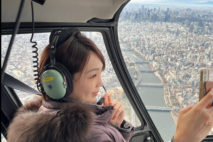 Experience Tokyo from above capturing stunning views of its iconic landmarks while enjoying the comfort of private transport. A unique perspective that transforms your travel memories.