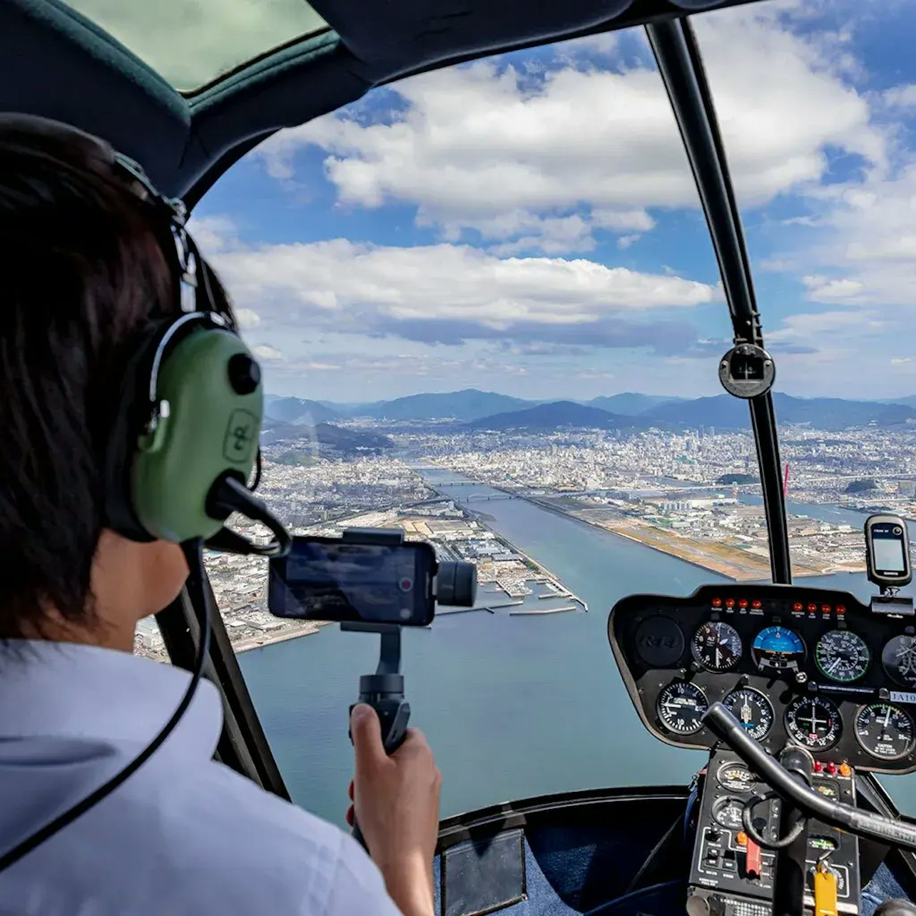 Soar over Tokyo's stunning skyline taking in breathtaking views of landmarks like the Rainbow Bridge and Tokyo Tower while enjoying an unforgettable helicopter experience.