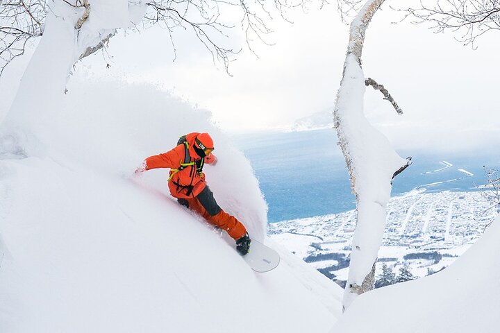 Experience the thrill of carving through pristine powder surrounded by breathtaking snow-covered landscapes. Perfect for those seeking adventure amidst Japan's stunning winter wonderland.