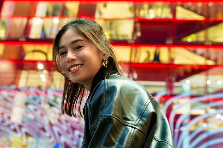 Experience the lively streets of Shibuya with expert guidance capturing spontaneous moments and artistic portraits against a backdrop of iconic cityscape and modern design. Perfect for travelers seeking unique memories.