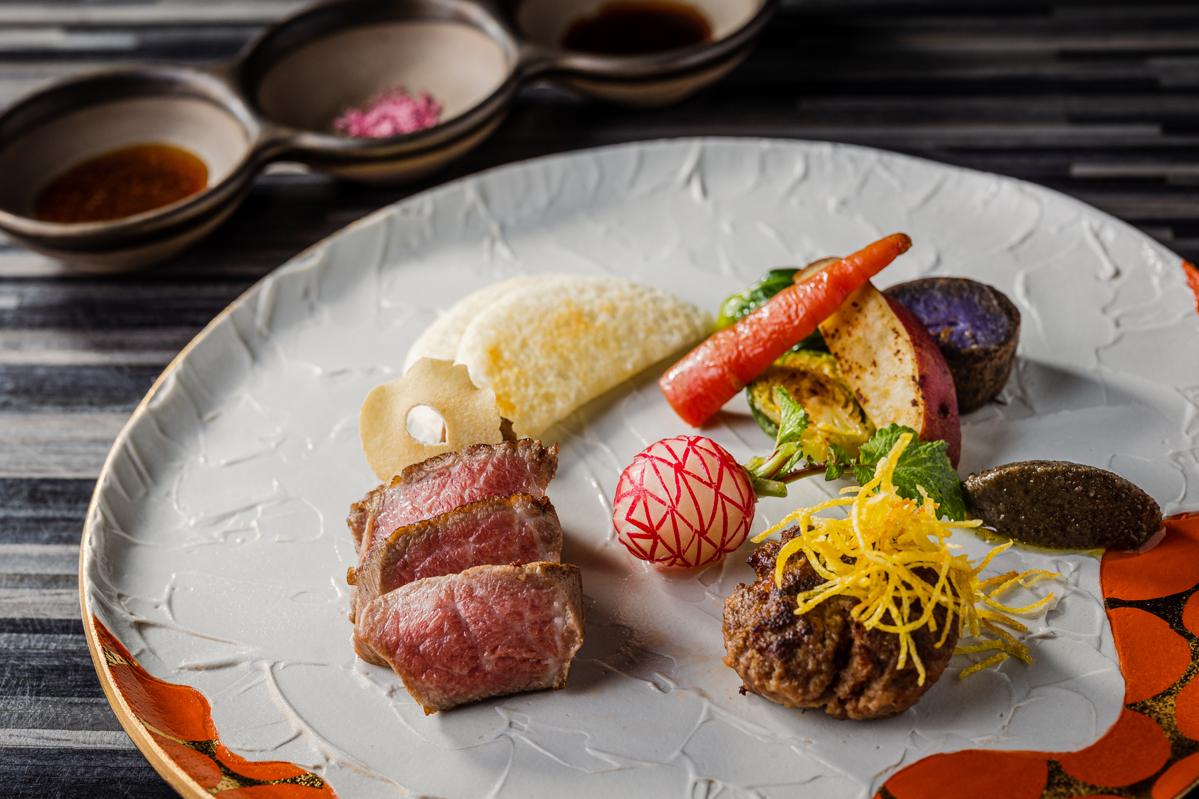 Experience the artistry of teppanyaki as master chefs skillfully prepare exquisite dishes right before your eyes transforming each meal into a culinary performance in an intimate setting.