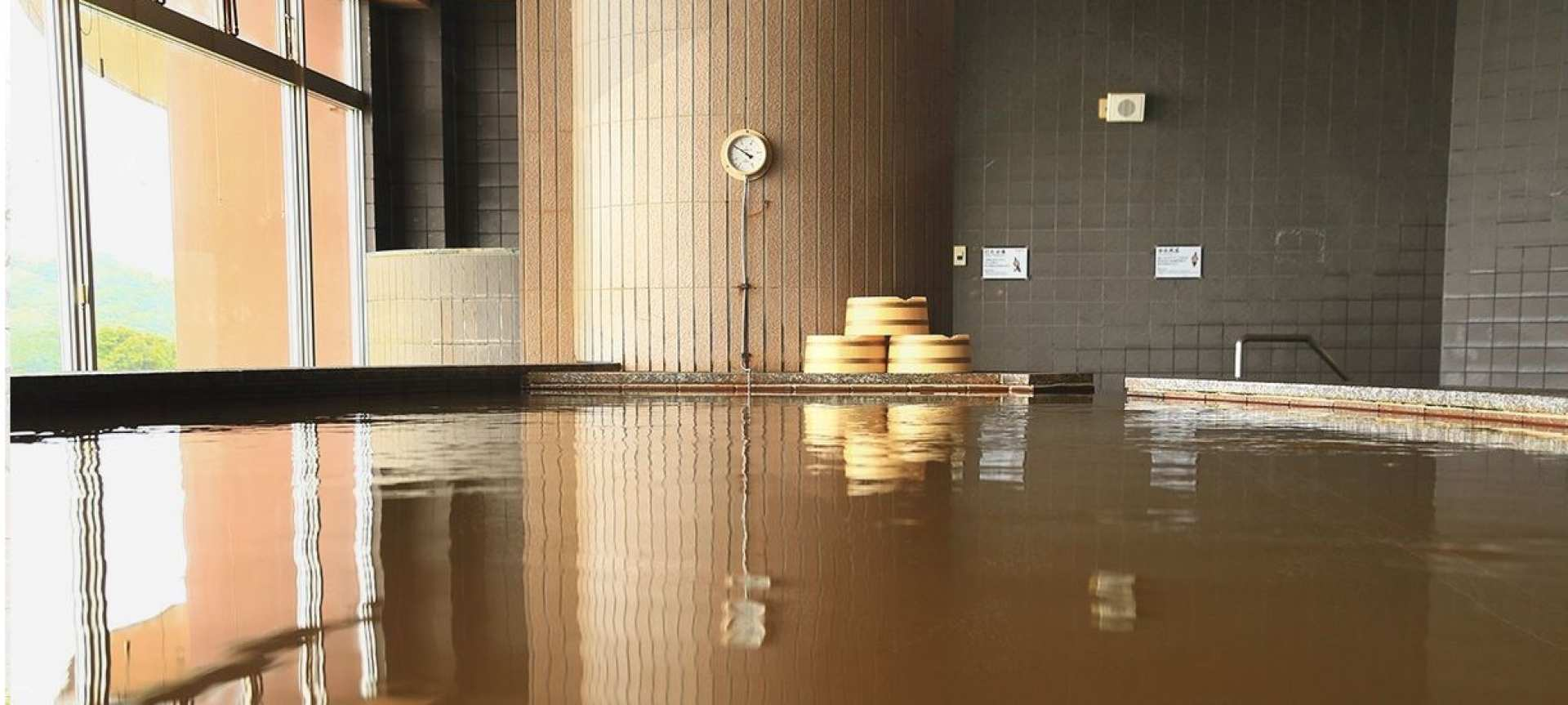 Relax in a private hot spring where mineral-rich waters flow from ancient depths offering a unique view of the sea—a true gem of Okinawa waiting to refresh your spirit.