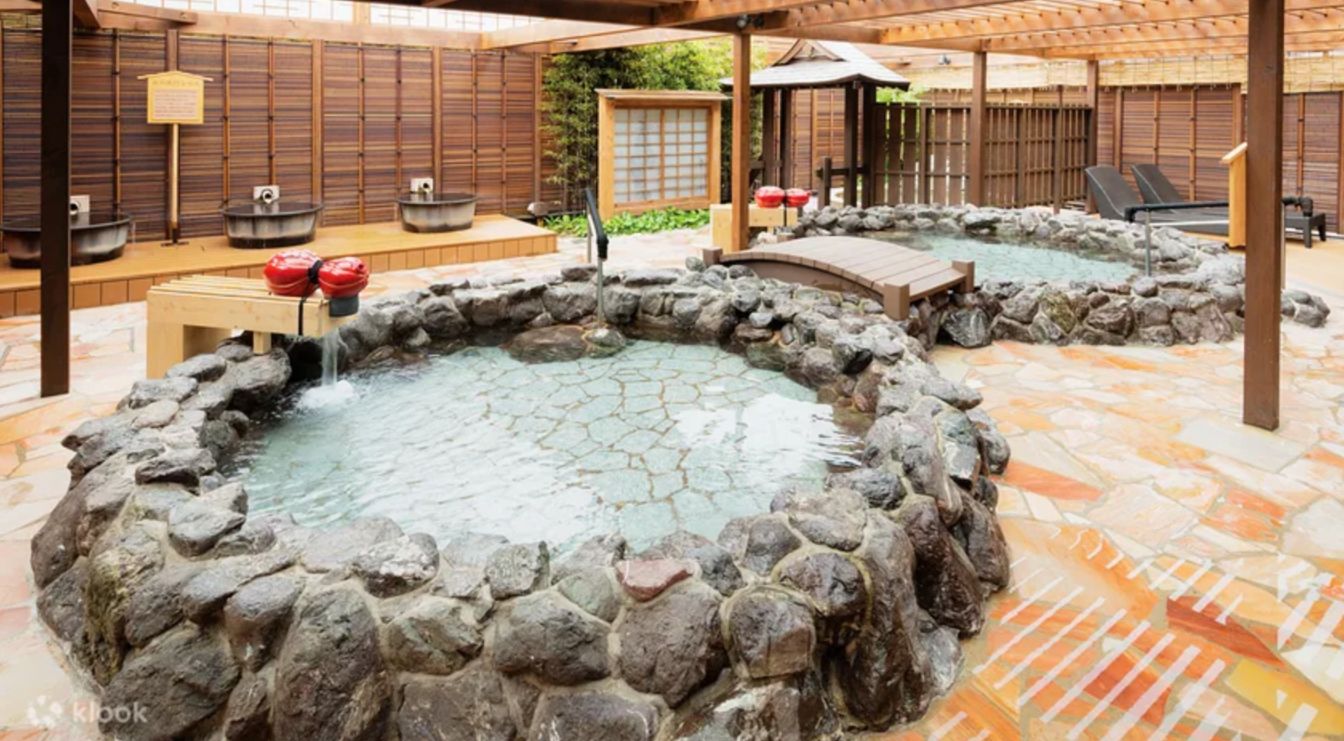 Immerse yourself in the soothing mineral-rich waters of Arima Onsen. Experience the perfect blend of traditional Japanese design and serene relaxation revitalizing your mind and body amid stunning scenery.
