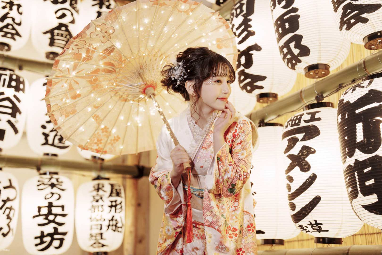 Experience traditional Japanese culture as you stroll the streets of Asakusa in a beautiful kimono or yukata surrounded by iconic lanterns capturing unforgettable memories with professional photography.