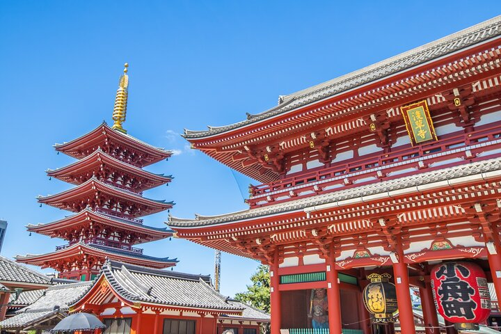 Explore the historic charm of Asakusa where the stunning Senso-ji Temple and its iconic pagoda invite travelers to experience Tokyo's rich heritage through architecture ritual and local culture.