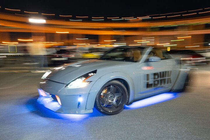 Experience the excitement of Yokohama's Daikoku parking area where stunning JDM cars light up the night creating unforgettable memories for car enthusiasts and newcomers alike.