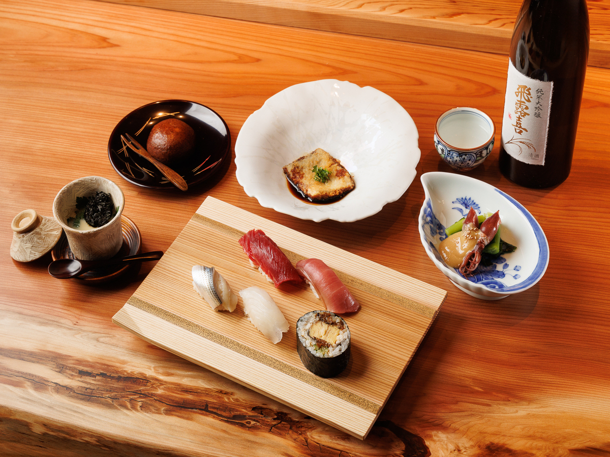 Experience authentic sushi artistry with a specially curated 18-course omakase showcasing seasonal ingredients sourced daily from Toyosu Market culminating in the luxurious Karin-maki roll.