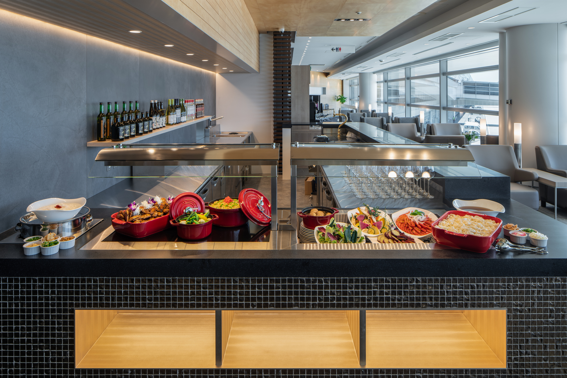 Relax in style at Plaza Premium Lounge where exquisite Asian and Western dishes await alongside complimentary Japanese liquors perfect for unwinding before your flight. Stay connected with fast Wi-Fi!