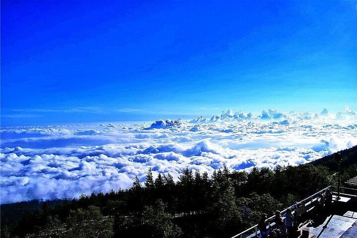 Experience breathtaking views above the clouds where the pristine beauty of Mount Fuji meets serene lakes. A perfect journey into Japan's soul revealing nature's tranquility and charm.