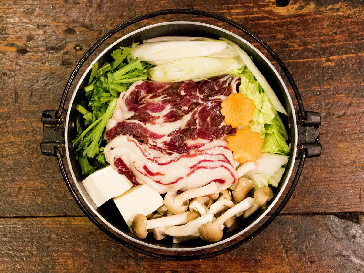 Savor a unique culinary adventure at Kome to Circus where Japanese game meat and diverse insect dishes come together in a quirky circus-themed setting perfect for food lovers seeking something new.