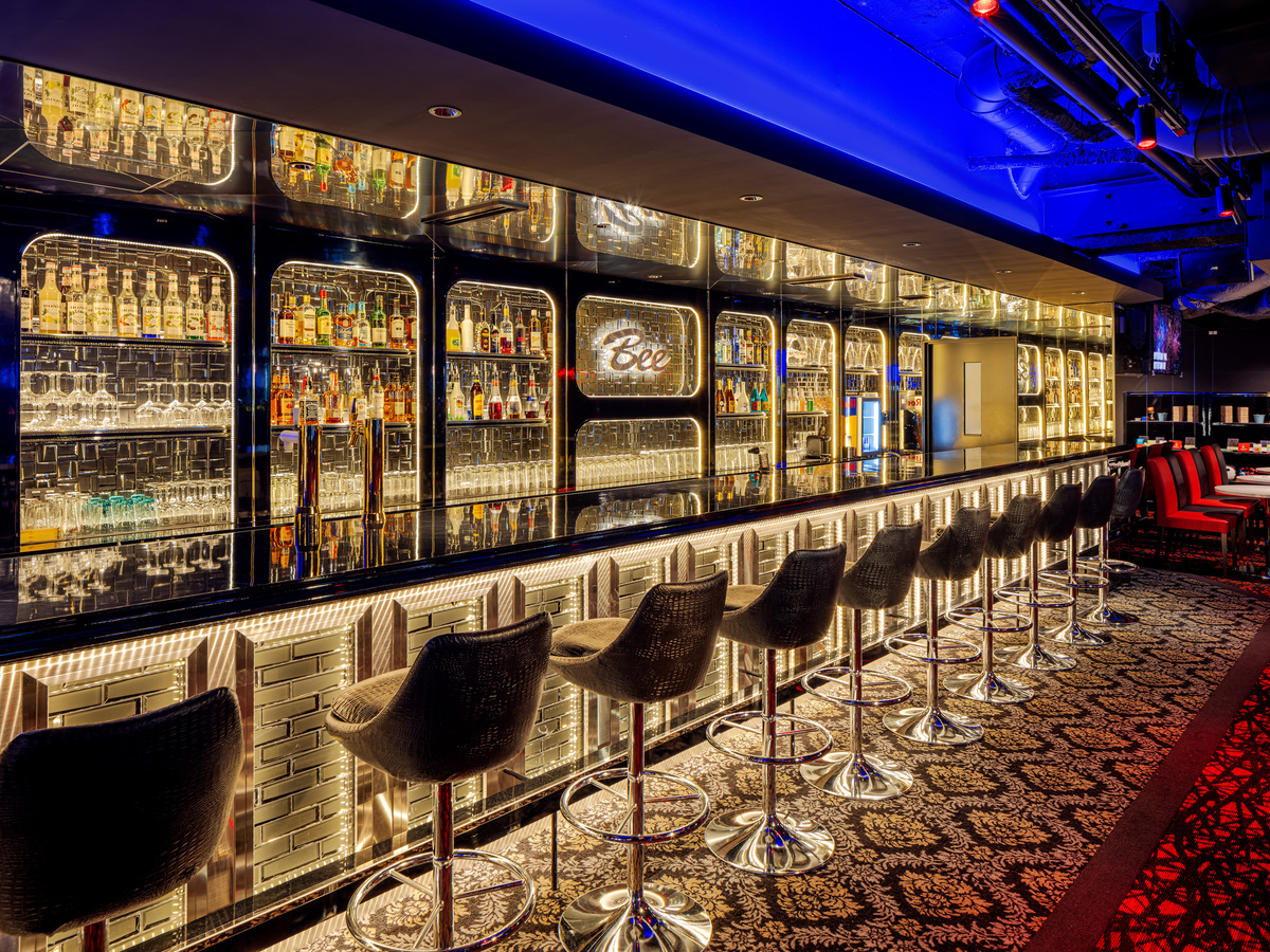 Discover a stylish spot to unwind with friends savor over 200 drink options and challenge yourself to darts and fun games all just steps from Namba Station in Osaka.