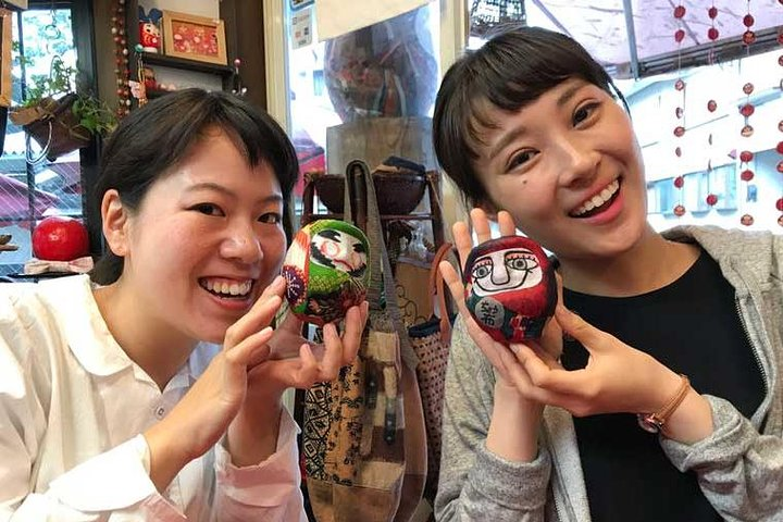 Immerse yourself in Japanese culture by crafting unique daruma dolls while enjoying tea and playful games making memorable souvenirs in the heart of Chofu.
