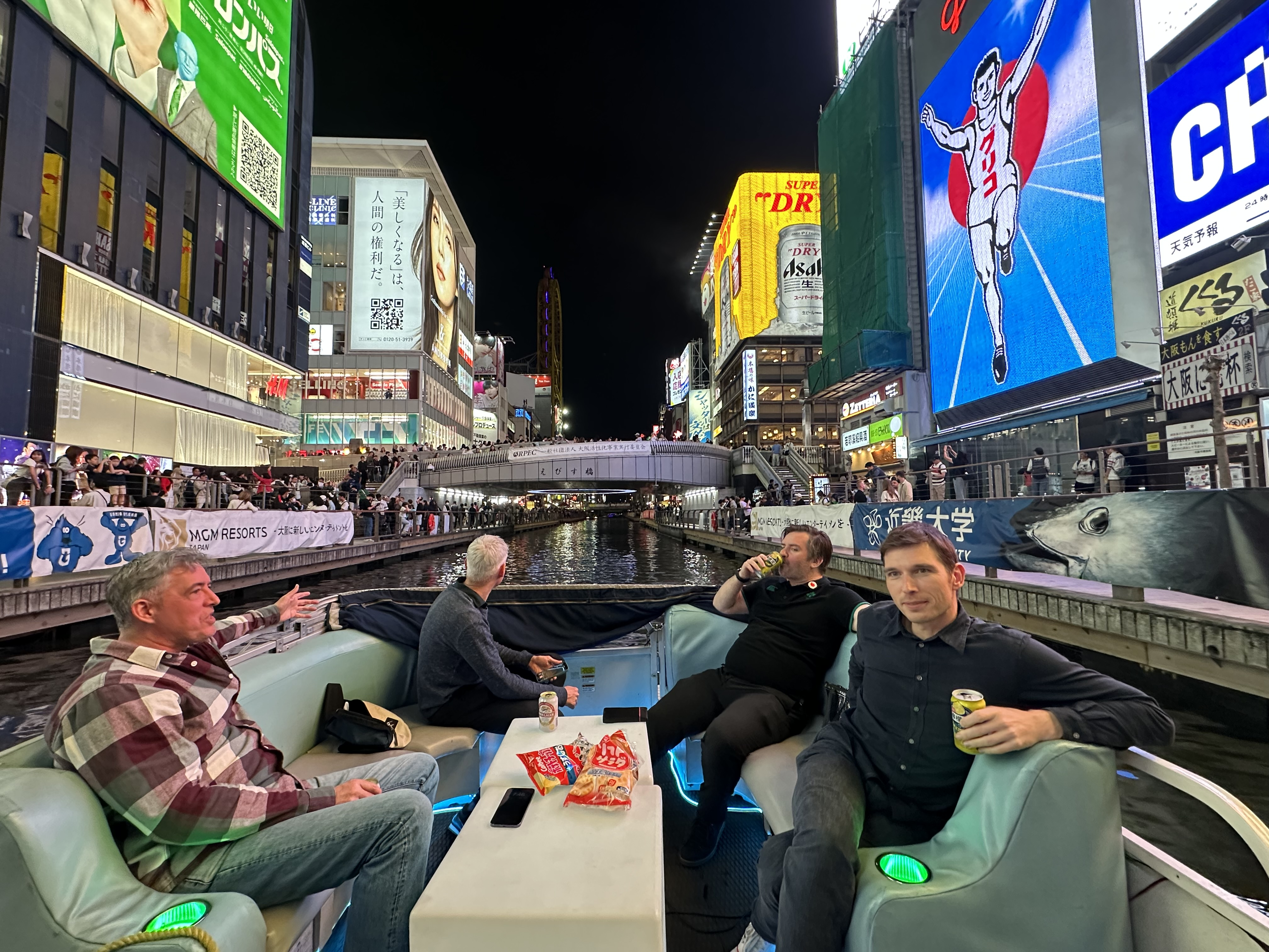 Dotonbori Sightseeing Cruise Enjoy a 20-minute ride with views of the Glico sign and lively downtown scenes from the water (Departs and returns at Minatomachi Pier) - Photo 1 of 15