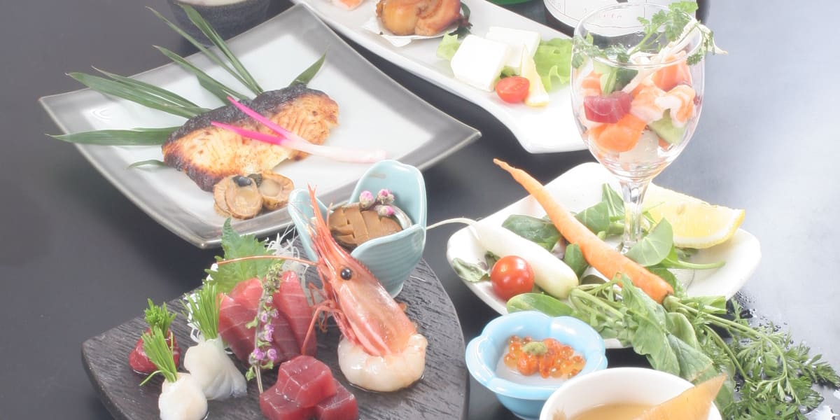 Savor the art of sushi in a serene setting where expert chefs showcase their skills while you enjoy an array of fresh seafood delicacies accompanied by a selection of drinks.
