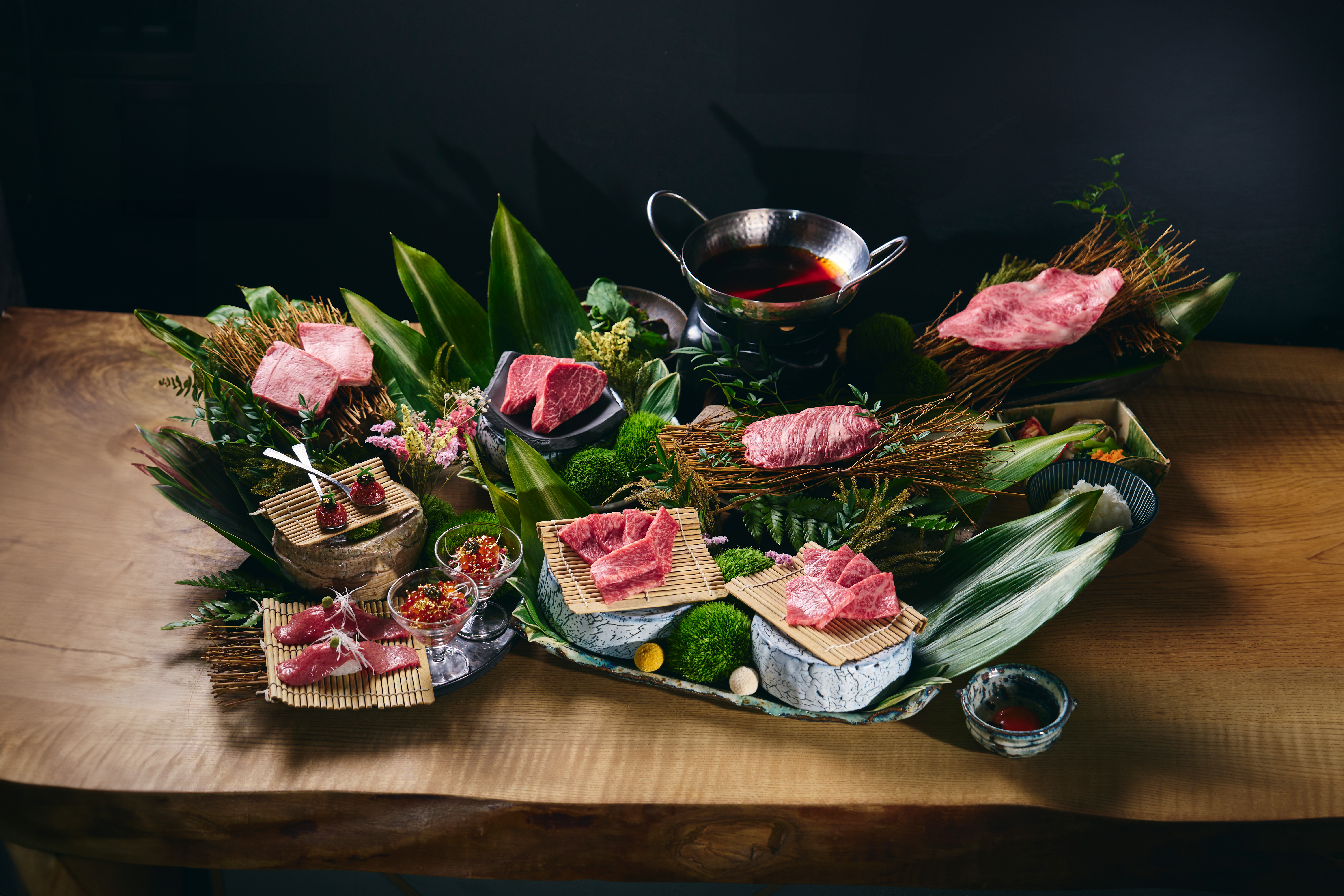 Experience the rich flavors of A5-ranked Wagyu beef grilled to perfection over charcoal paired with exceptional wines creating a memorable dining experience in Osaka's Kitashinchi district.