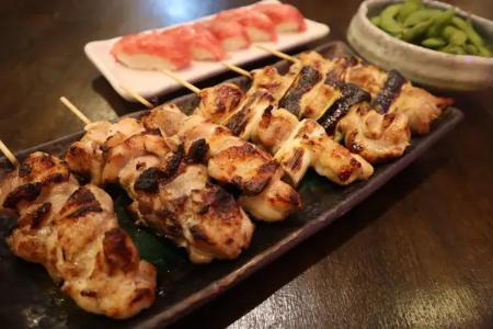 Savor the authentic flavors of Tokyo with delicious yakitori and unique meat sushi all just a walk away from the vibrant Shibuya scene perfect for culinary explorers.