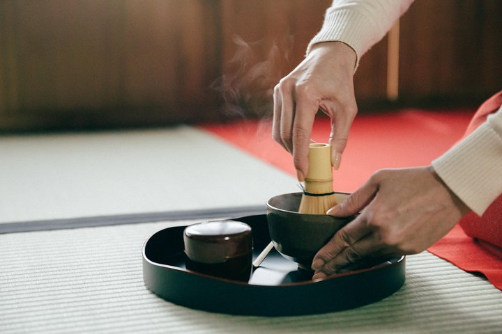 Immerse yourself in traditional Japanese culture with a serene tea ceremony surrounded by tatami mats and classic architecture while exploring the rich history of Nagoya's samurai heritage.