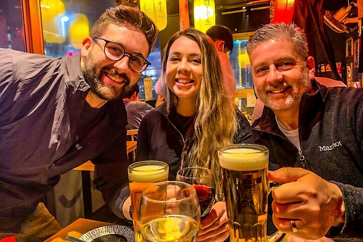 Uncover local treasures in Shinjuku as you savor delicious izakaya dishes and drinks with friendly company. Experience authentic Japanese culture firsthand in a lively bar setting.