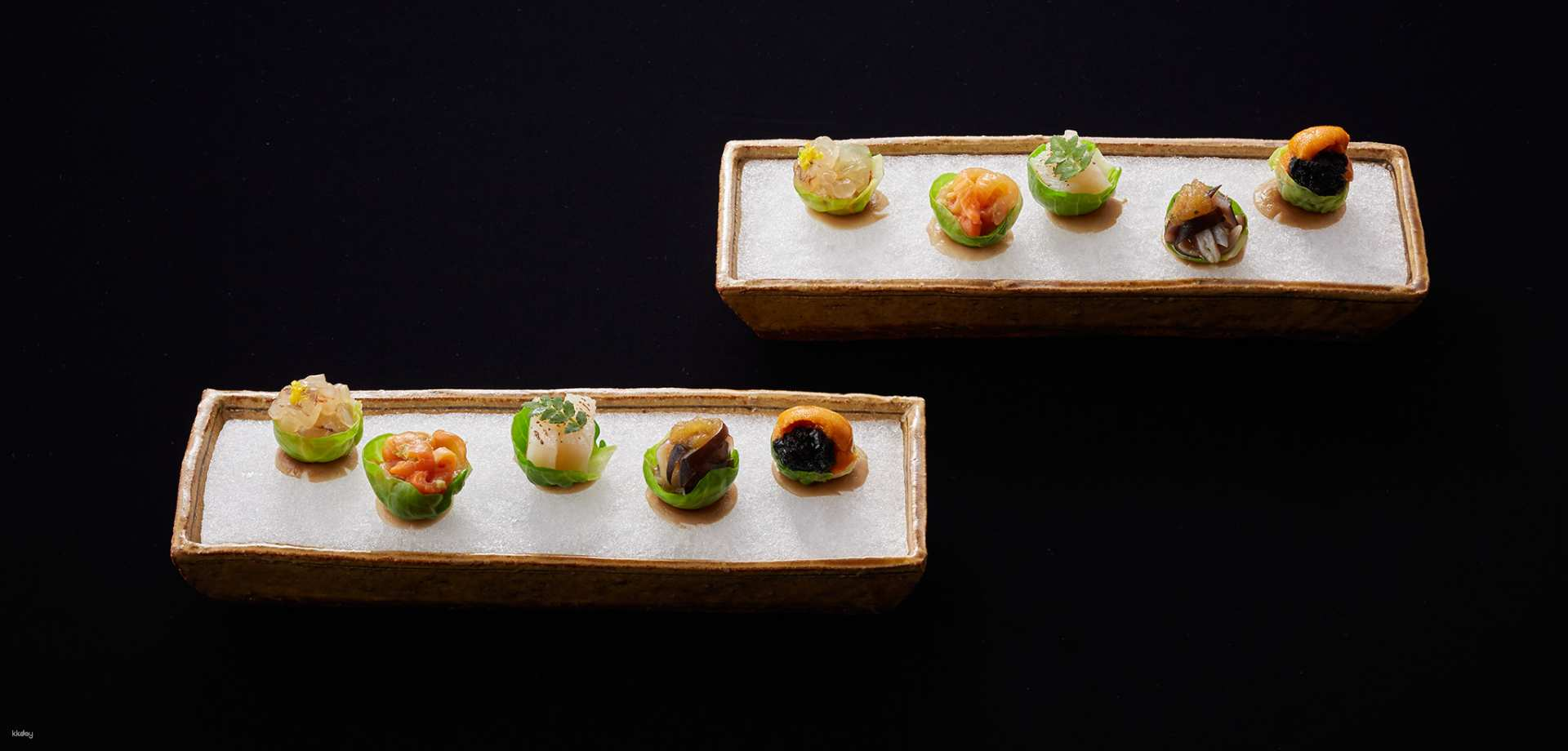 Savor exquisite kaiseki dishes at Kashiwaya where each bite reflects Japan's culinary artistry surrounded by a serene garden and tasteful Zen-inspired design. A true delight for food enthusiasts.