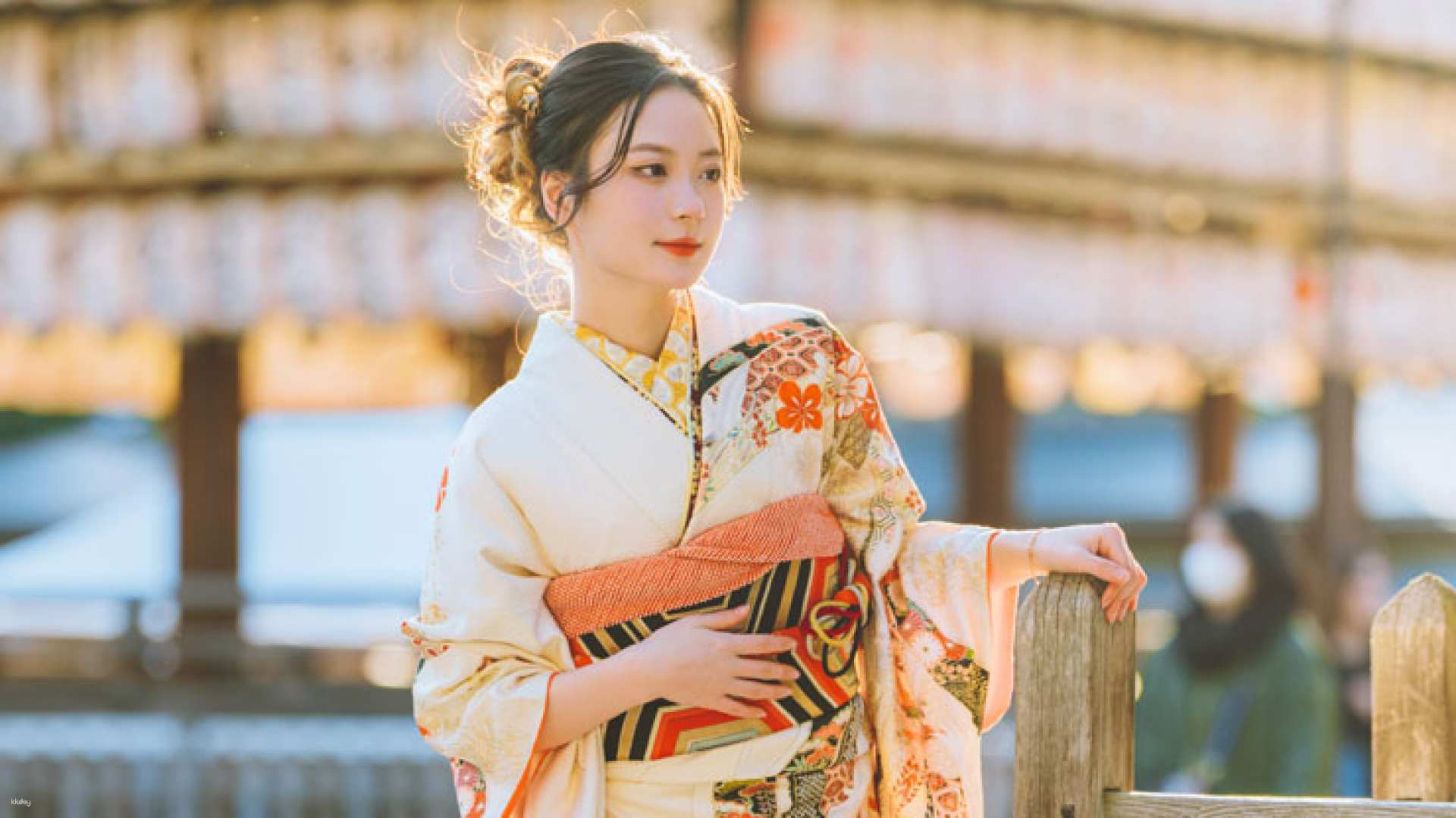 Experience traditional Japanese culture while strolling near Sensoji Temple adorned in a beautifully crafted kimono or yukata perfectly complemented by the scenic surroundings and iconic lanterns.